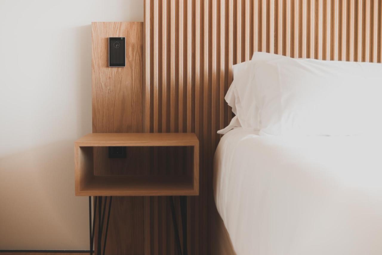 Atmos Hotel Boutique Outes المظهر الخارجي الصورة