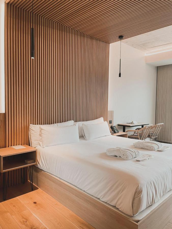 Atmos Hotel Boutique Outes المظهر الخارجي الصورة